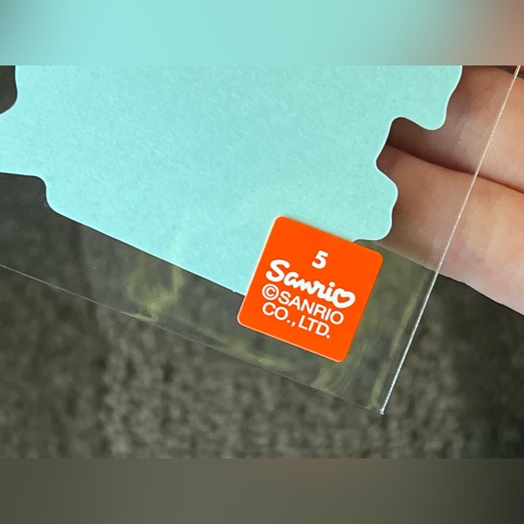 Girl Holding Hello Kitty Plush B-Side Label Sticker Water & UV Ray Protected - Picture 5 of 5